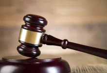 Judge’s gavel in courtroom