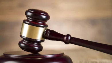 Judge’s gavel in courtroom